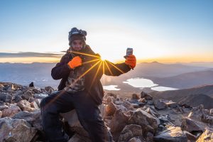 At the summit of Colorado's highest 14er, Mt Elbert, at sunrise
