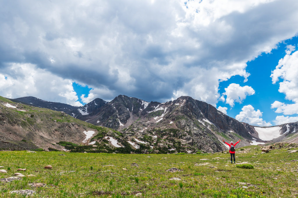 hiker in open tundra in the Rocky Muntain National Park