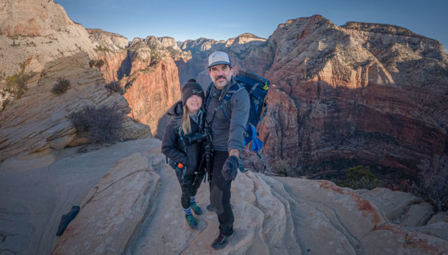 two hikers on the summit of Angels Landing in Zion National Park