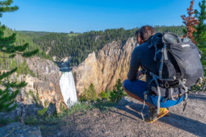 upper yellowstone falls and hiker